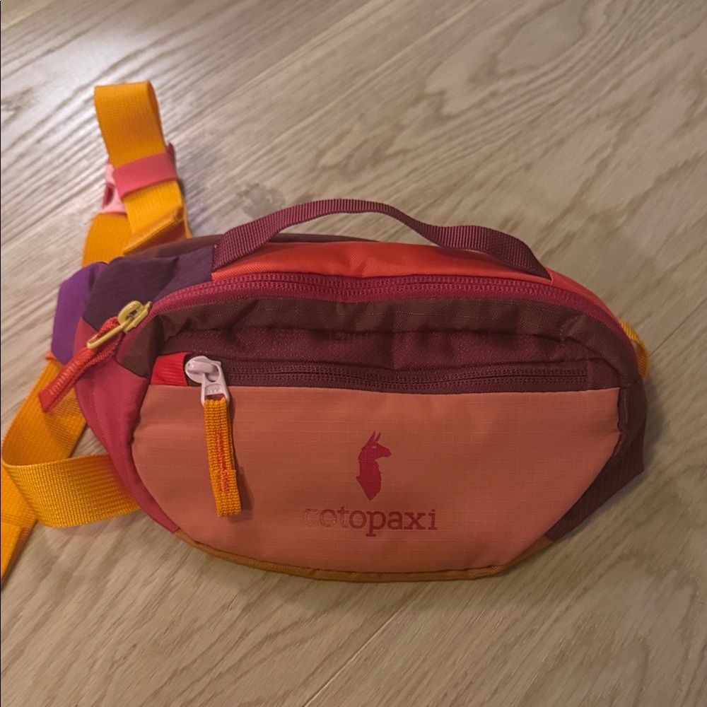 Cotopaxi Multicolor Hip Pack with Orange and Red Accents